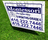 Montessori academy blue lawn sign